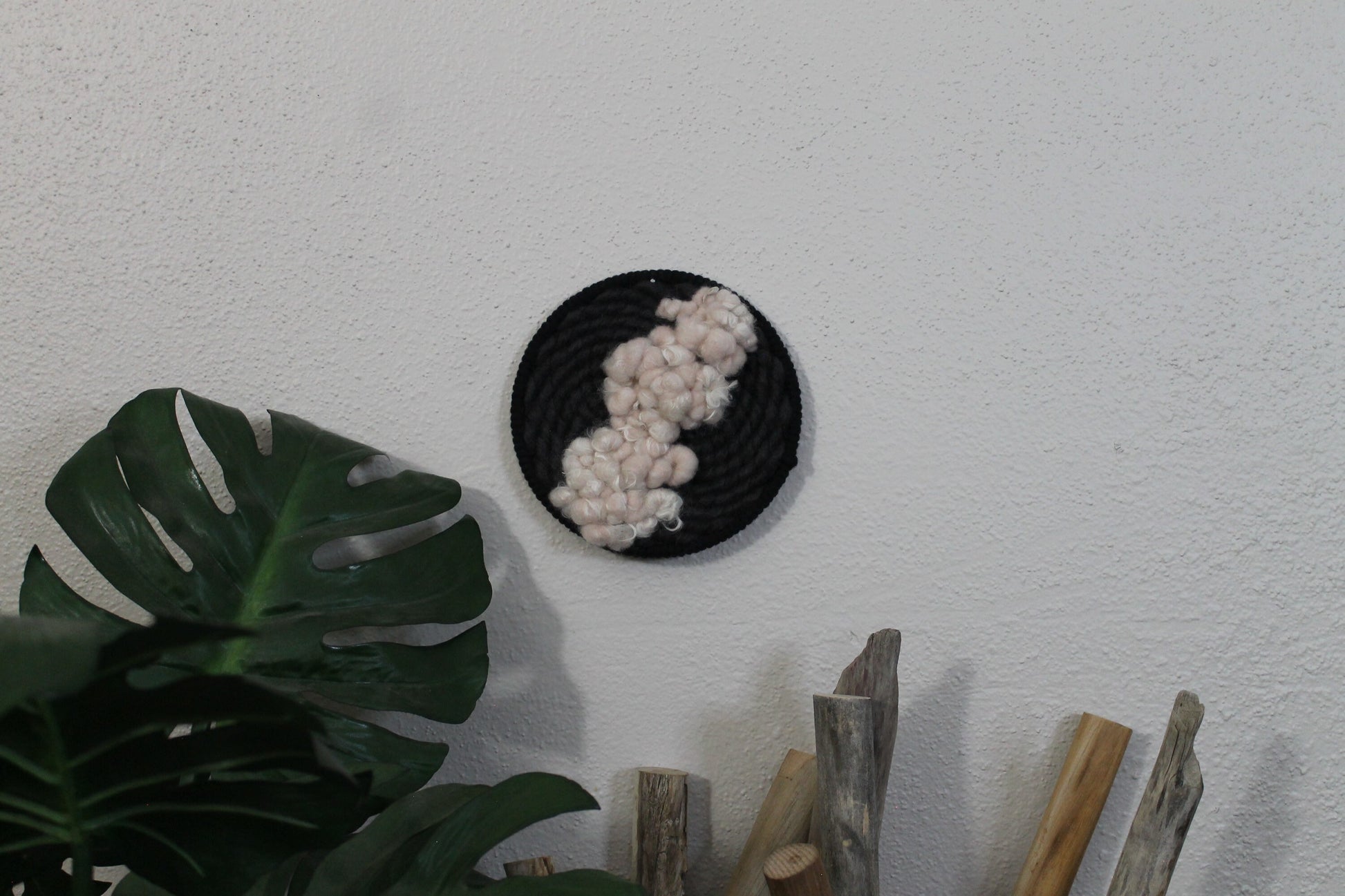 Pink and black round woven wall hanging | wall art | weaving | woven tapestry | wall decor | wall tapestry | home decor | tapestry