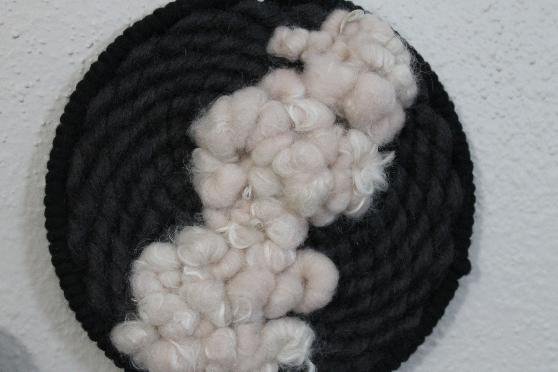 Pink and black round woven wall hanging | wall art | weaving | woven tapestry | wall decor | wall tapestry | home decor | tapestry