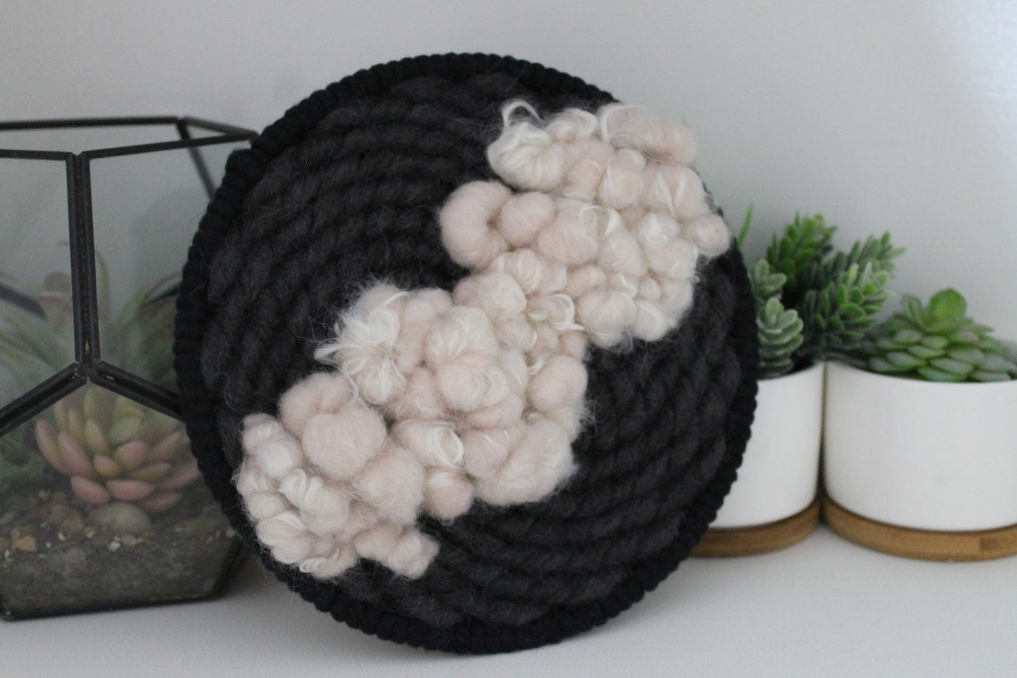 Pink and black round woven wall hanging | wall art | weaving | woven tapestry | wall decor | wall tapestry | home decor | tapestry